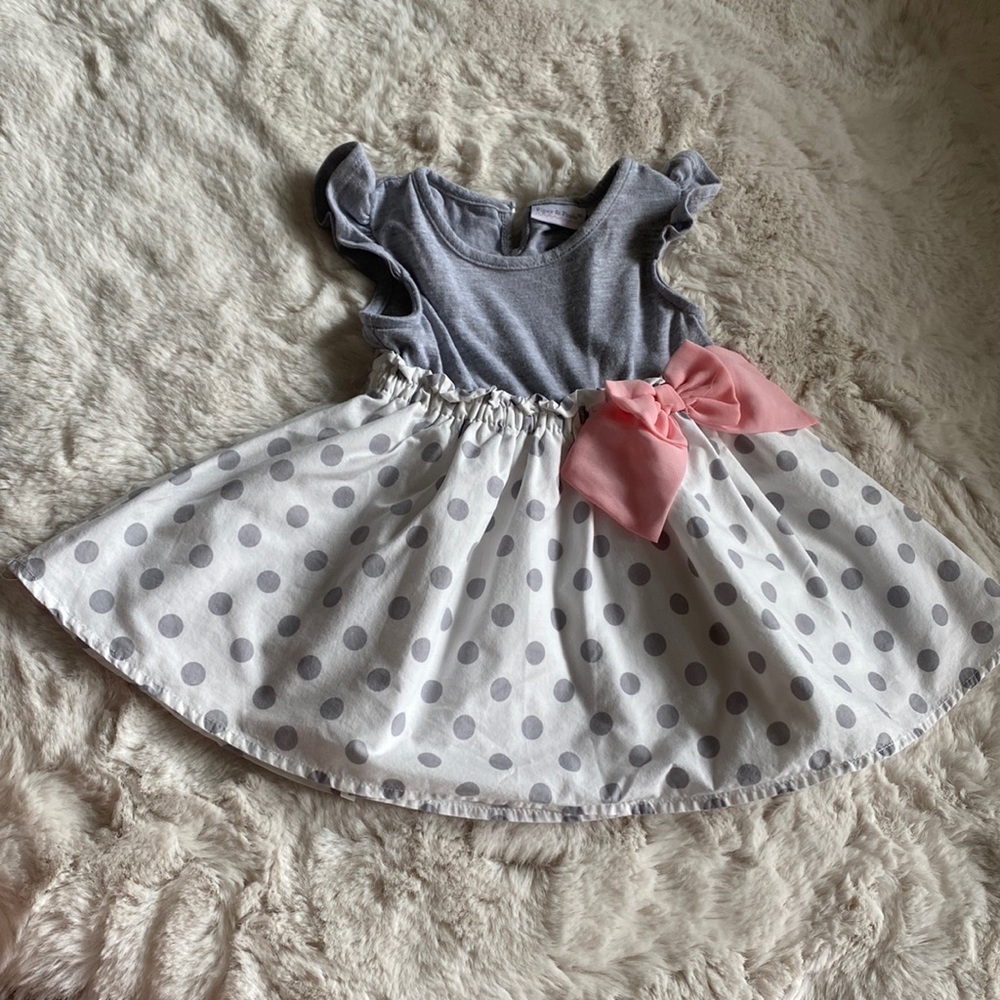 Beautiful summer dress for 6 to 9 months baby girl. Gray & white color pink bow